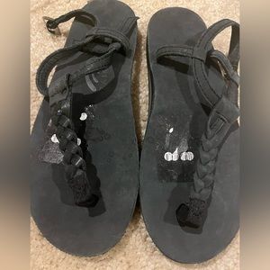 Woman’s rainbow sandals